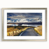 Textured art featuring abstract depiction of Canterbury, New Zealand in muted earth tones on a framed silver mat.