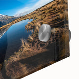 Large abstract wall art depicting New Zealand's Taranaki scenery in muted green and blue tones on acrylic glass.