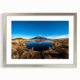 Textured art of Mount Taranaki in abstract style with cool gray palette, framed in silver, ideal for bedroom art.