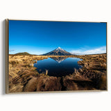 Framed canvas landscape art of Taranaki, New Zealand in muted greens and blues, ideal for bedroom wall decor.