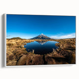 Vintage poster art featuring a scenic view of Taranaki, New Zealand in vibrant colors on a large framed canvas.