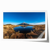 Extra large rolled print of Taranaki scenery in New Zealand, featuring muted green and blue tones.
