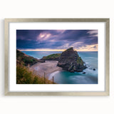 Textured abstract art print of New Zealand's West Coast in muted blue and gray tones, framed in silver.