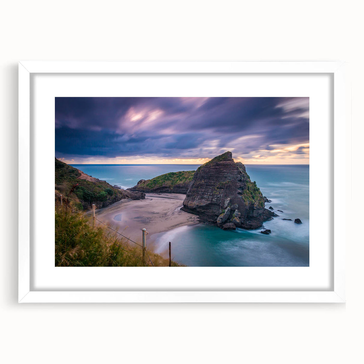 Abstract art print of New Zealand's West Coast in muted gray and blue tones, framed with a white mat.