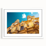 Abstract art print of Buenos Aires skyline in muted blue and gray tones on a white-framed mat.