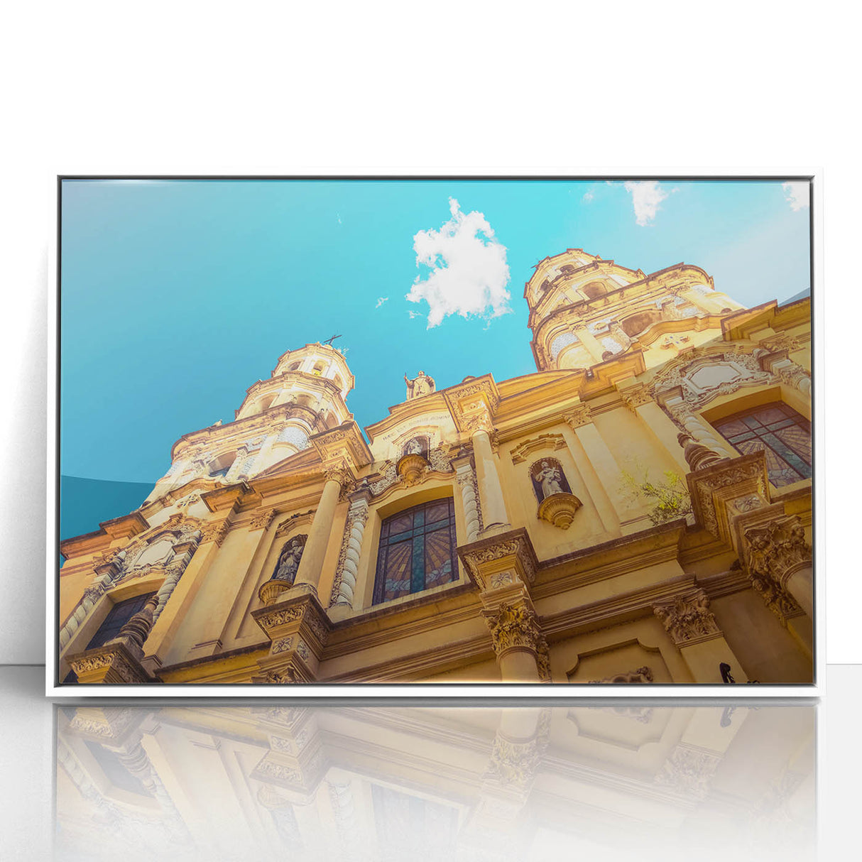 Art deco poster of Buenos Aires skyline in muted blue tones, acrylic print framed in white.