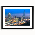 Extra large framed wall art of an abstract Santiago cityscape in vibrant, textured colors, ideal for living room decor.