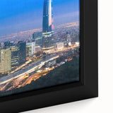 Black wall art featuring a textured close-up of Santiago, Chile in colorful hues on a framed canvas.