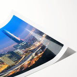 Extra large wall art featuring line art flowers in muted earth tones on a rolled print, suitable for large living room decor.