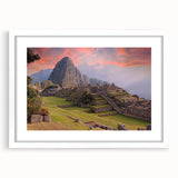 Abstract art print of Machu Picchu in muted green and brown tones on a framed white mat, ideal for dining room decor.