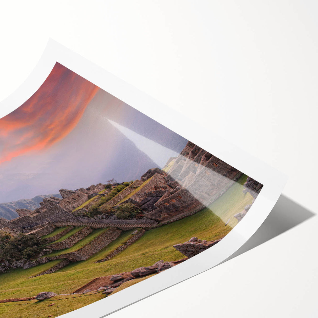 Extra large wall art depicting Machu Picchu in muted green and brown tones on a rolled canvas.