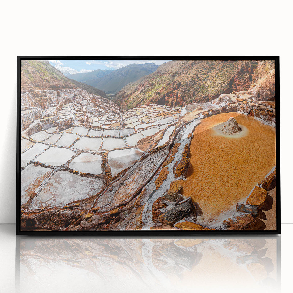 Large abstract wall art depicting a stylized Peruvian landscape in muted earth tones, framed in black acrylic.