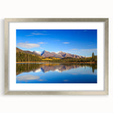 Textured abstract art print of Alaska scenery in muted earth tones, silver-framed with mat, suitable for bedroom decor.