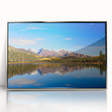 Mid-century modernist art depicting Alaska scenery in muted earth tones on a silver-framed acrylic print.