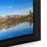 Extra large framed canvas featuring a textured depiction of an Alaskan landscape in black with colorful accents.