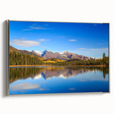 Framed canvas featuring a vintage-style landscape of Alaska with colorful art elements and a black border.