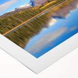 Art deco poster of Alaska scenery in muted blue and white tones on rolled canvas, suitable for dining room wall art.