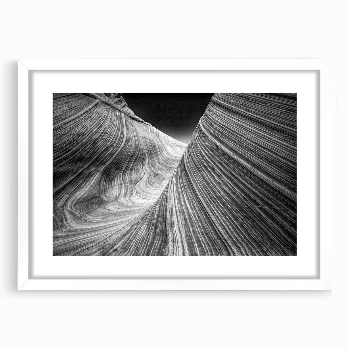 Abstract art print of Arizona's Coyote Buttes in muted earth tones on a white-framed canvas, ideal for dining room decor.