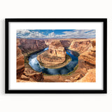 Abstract art print of Glen Canyon in vibrant colors on a large, textured canvas, framed in black.