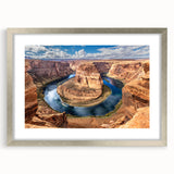Textured art print of Glen Canyon in muted earth tones on a silver-framed canvas, suitable for bedroom decor.