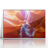 Acrylic print of the Grand Canyon in neutral tones, framed in white, suitable for modern art wall decor.