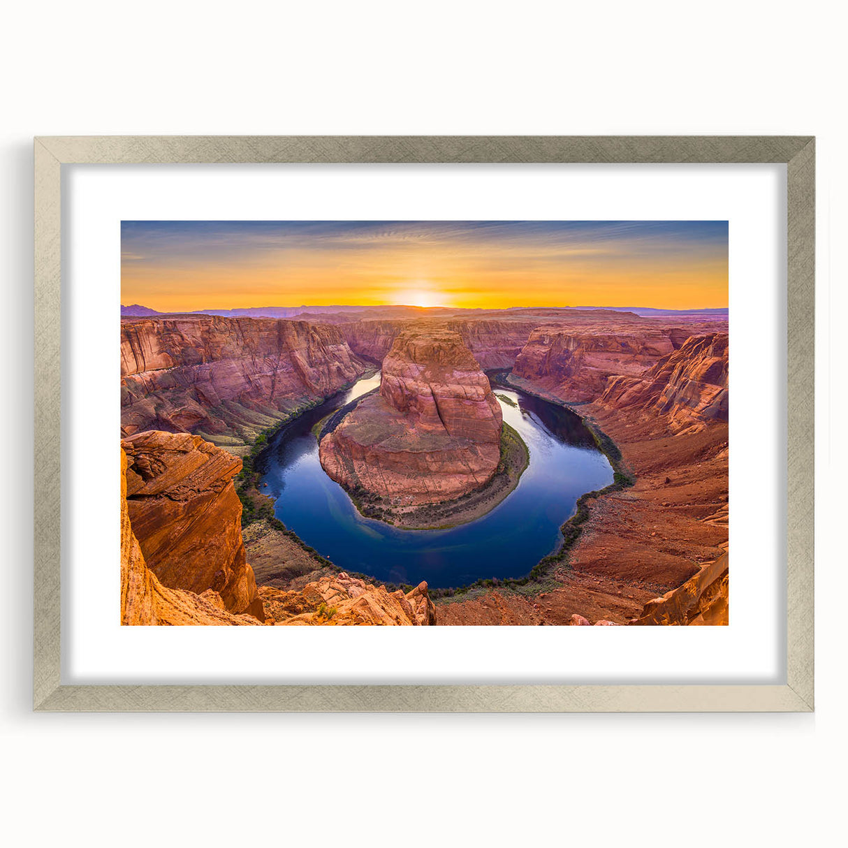 Textured art print of Horseshoe Bend in Arizona with muted earth tones, framed in silver, ideal for bedroom decor.