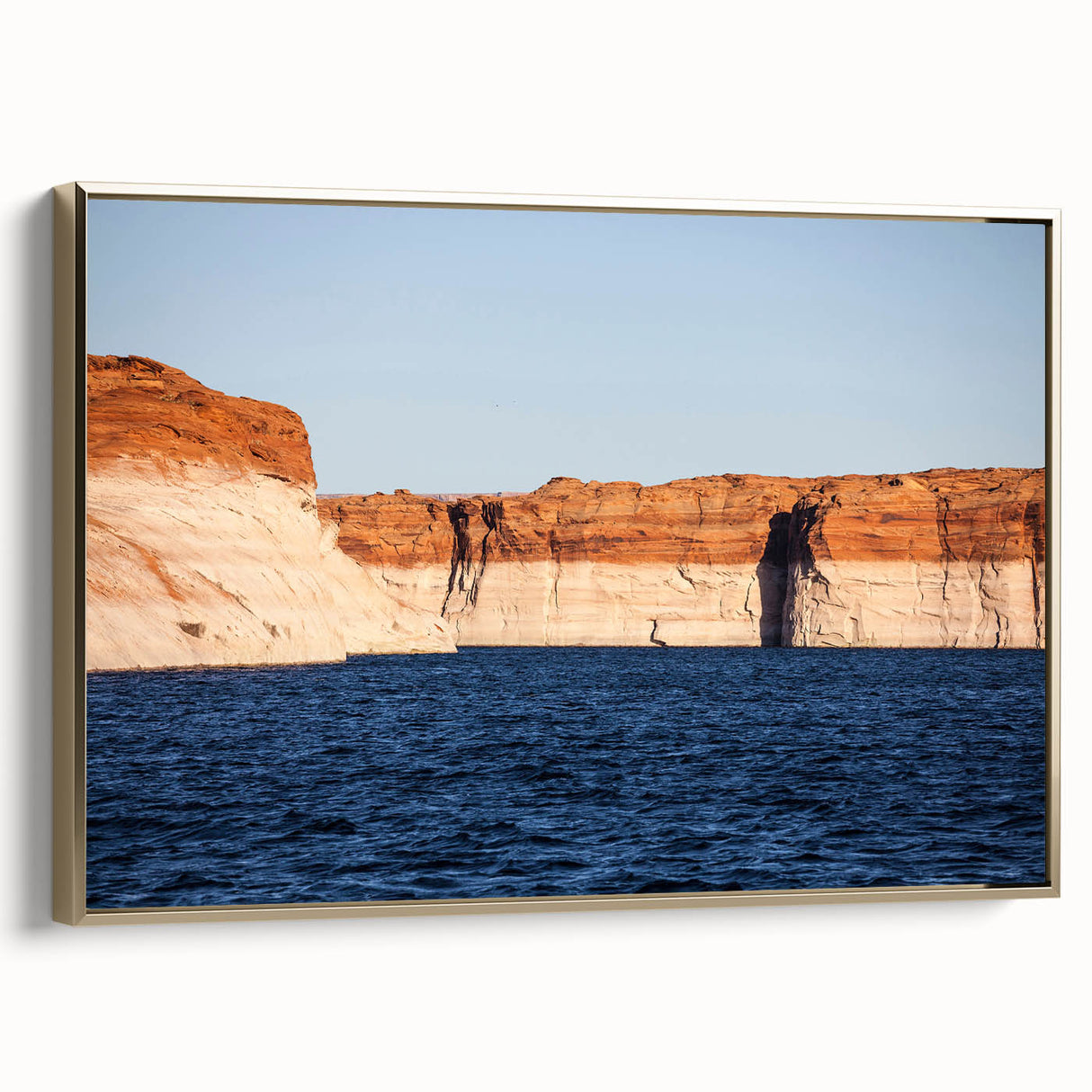 Framed canvas of Lake Powell with gold tones, ideal for bedroom wall art.