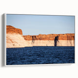 Vintage poster art of Lake Powell on a framed canvas, featuring vibrant blue and red tones, ideal for living room decor.
