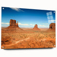 Acrylic print of Monument Valley with vivid orange and red tones, suitable for bedroom or dining room decor.