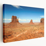 Monument Valley landscape on stretched canvas, featuring rich red and orange tones, suitable for kitchen wall art.