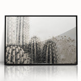 Large abstract wall art of Sedona landscape in muted earth tones, framed in black acrylic.