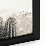 Close-up of textured black wall art featuring a colorful Arizona Sedona landscape on a framed canvas.
