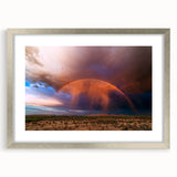 Textured art print of the Sonoran desert in muted earth tones, framed in silver, ideal for bedroom wall decor.