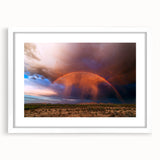 Abstract art print of Sonoran Desert with vibrant earth tones on a white-framed canvas, suitable for dining room decor.