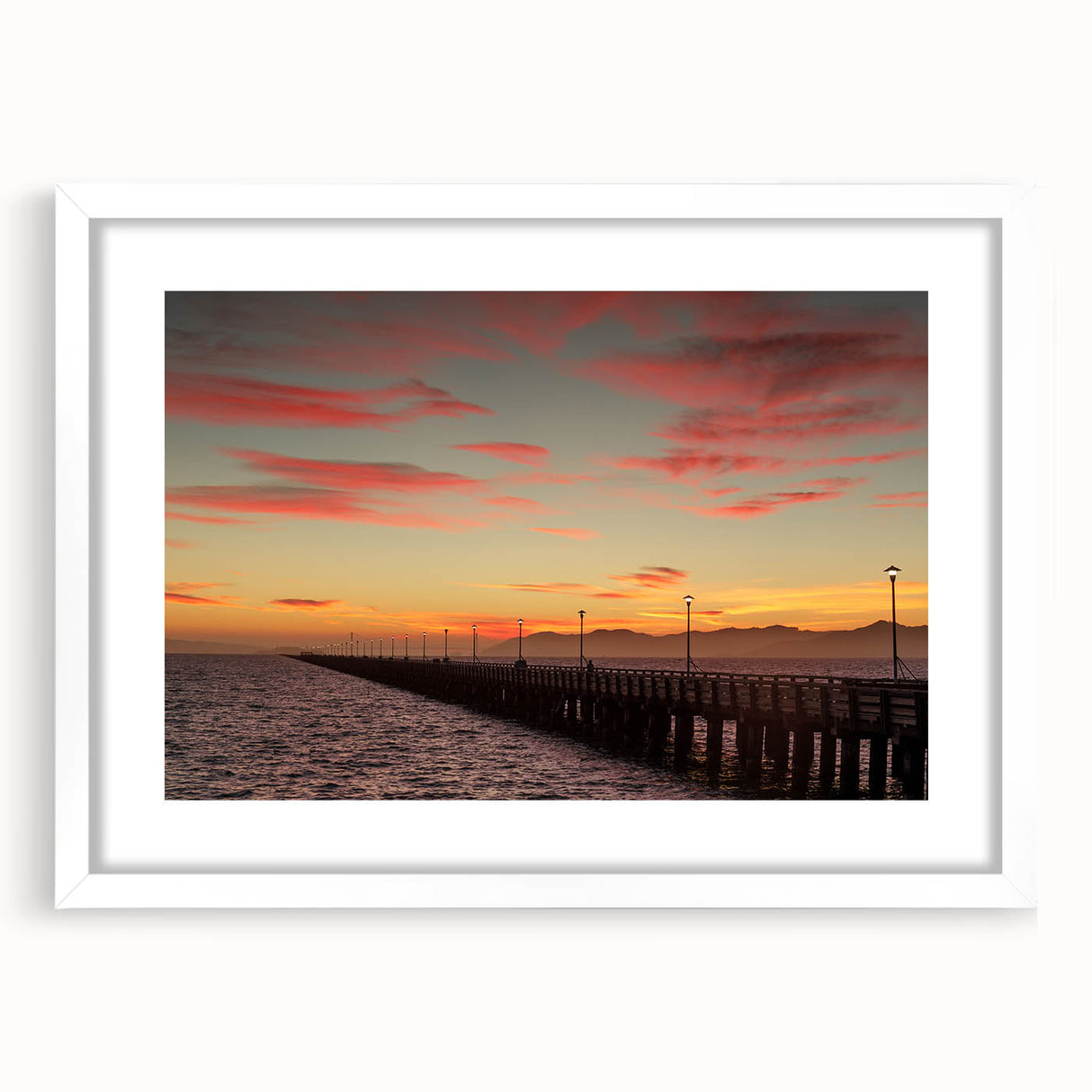 Abstract art print of Berkeley, California in muted earth tones on a white framed canvas, suitable for dining room decor.