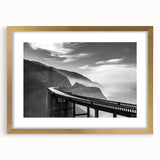 Extra large abstract art print of Big Sur, California in gold frame, featuring textured blues and greens.