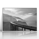 Acrylic print of Big Sur coastline in soft gray and blue tones, framed in white, suitable for modern nursery decor.