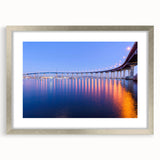 Textured abstract art print depicting a Californian landscape in muted earth tones on a framed canvas.