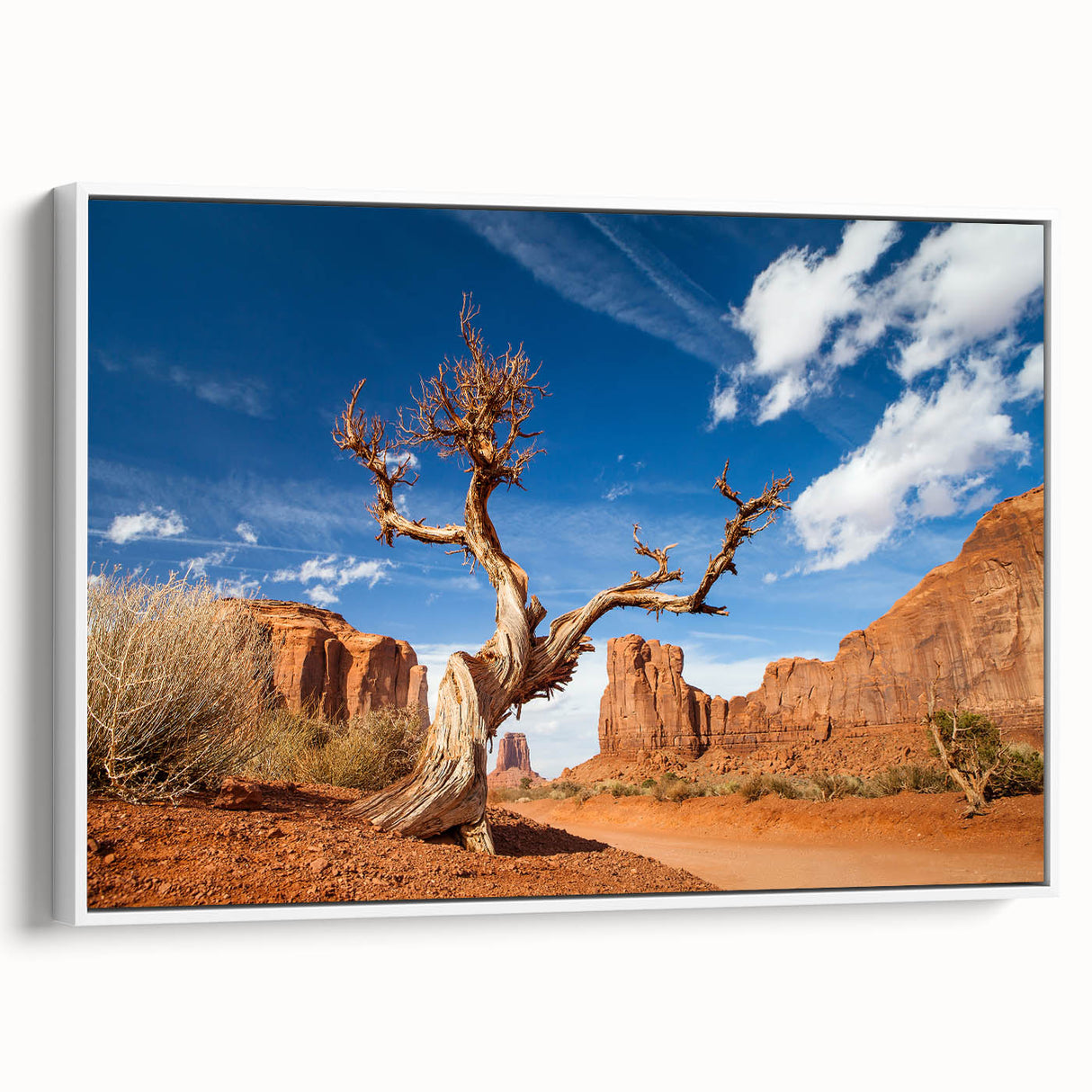 Vintage poster art of Death Valley in muted earth tones on a large framed canvas, ideal for living room decor.