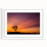 Abstract art print of Joshua Tree in muted earth tones on a framed white canvas, ideal for bedroom or dining room decor.