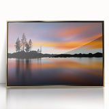 Mid-century modernist art of Lake Tahoe in muted blue and green hues on a gold-framed acrylic.