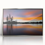 Mid-century modernist art of Lake Tahoe in acrylic, framed in silver, with cool blue and green tones.