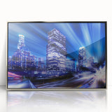 Mid-century modernist art of Los Angeles skyline in muted gray tones on silver-framed acrylic.