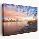Side view of a stretched canvas featuring a scenic depiction of San Diego with muted blue and white tones.