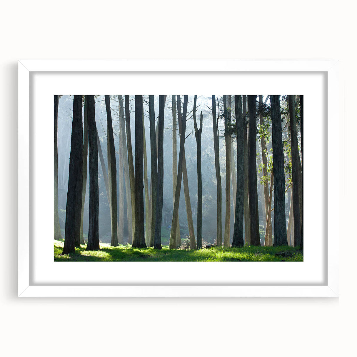 Abstract art print of San Francisco skyline in muted gray and blue tones on a framed white canvas.
