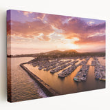 Large art depicting the Santa Barbara coastline in muted blue and green shades on stretched canvas.