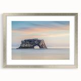 Textured abstract art print of Santa Cruz in muted earth tones on a framed silver mat, suitable for bedroom decor.