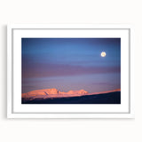 Abstract art print of Sierra Nevada in muted earth tones on a white framed mat, suitable for bedroom or dining room decor.
