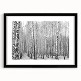 Abstract art print of Aspen scenery in vibrant colors on textured canvas, framed in black, ideal for living room decor.