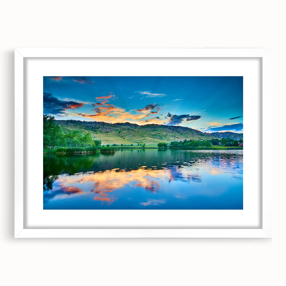 Abstract art print of Boulder, Colorado in muted earth tones on a framed white mat, suitable for dining room decor.